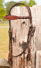 Braided headstall and reins are available in chestnut and black.
